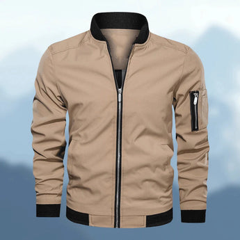 Men's slim fit navy bomber jacket with zipper pocket, featuring a lightweight design, long sleeves, and a classic collar.