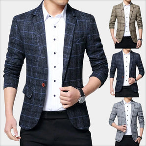 Men's slim fit plaid tweed blazer in black and white tartan pattern, featuring a stylish design suitable for office wear, with long sleeves and a tailored neck, paired with black trousers and a white dress shirt.