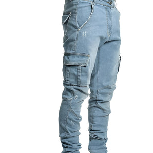 Men's slim fit tapered cargo jeans in light wash denim featuring zipper pockets, shown in blue color and size 3XL.