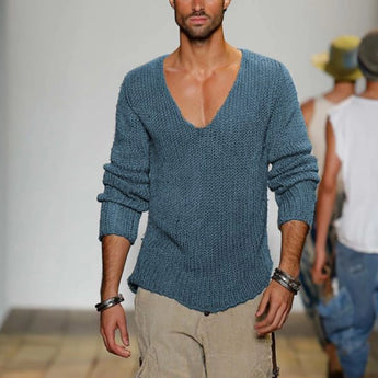 Men's blue slim fit V-neck thermal knit sweater in XL size, featuring earth tone hues, with visible shoulder and sleeve detailing, and worn by a person with a beard.