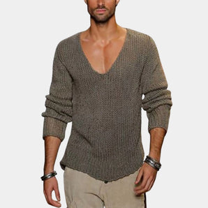 Men's slim fit V-neck thermal knit sweater in earth tone, featuring long sleeves and a comfortable fit. The sweater is paired with a dress shirt underneath, worn by a man with a beard.