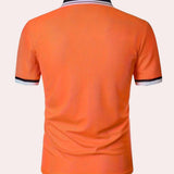 Men's orange polo shirt with contrast collar and short sleeves, featuring a breathable fabric ideal for sportswear.