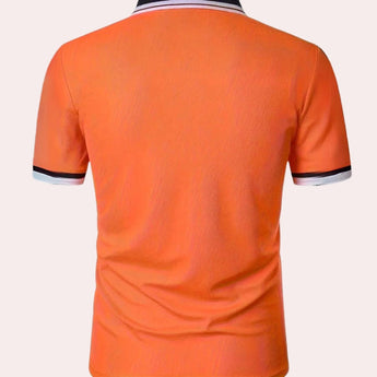 Men's orange polo shirt with contrast collar and short sleeves, featuring a breathable fabric ideal for sportswear.