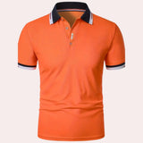 Men's orange polo shirt with a contrast collar and short sleeves, designed for breathability and style.