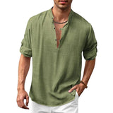 Men's stylish green V-neck linen shirt in size 2XL, featuring a lightweight and breathable design ideal for summer, showcasing details like short sleeves and a comfortable fit on the arms and shoulders.