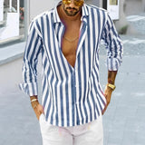 Man wearing a blue and white striped long sleeve shirt with a casual relaxed fit, featuring a 3XL size. The shirt is styled with a hat and eyewear, embodying a summer look.