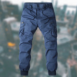 Men's blue tactical cargo pants in size 3XL, featuring a durable and water-resistant fabric with multiple pockets, designed for functionality and style.
