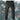 Men's black tactical cargo pants in 3XL size, showcasing durable, water-resistant fabric with multiple pockets, modeled on a person standing next to a tire.