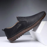 Tan leather slip-on loafers for men, designed for comfort and lightweight wear, featuring a classic and versatile style.