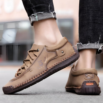 Men's tan leather sneakers in beige, size 46, featuring a hand-stitched design with a durable and breathable construction.