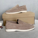 Men's tan suede loafers in beige, featuring a slip-on design with contrast stitching, displayed in size 47.