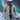 Men's gray waterproof insulated parka in size 3XL, featuring a heavy-duty hood, long sleeves, and a stylish collar, photographed with a flash to highlight its outerwear design.