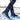 Men's waterproof insulated winter boots in an electric blue color, designed for slip-resistance on snowy slopes; shown being worn outdoors, highlighting the knee-length coverage and sturdy construction suitable for freezing conditions.
