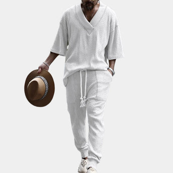 Men's white cable-knit hoodie and pants set in extra-large size, featuring cozy winter knitwear design with long sleeves and a relaxed fit.