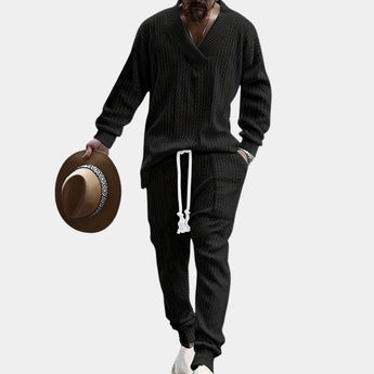 Men's black cable-knit hoodie and pants set in XL, featuring long sleeves and a cozy, textured design suitable for winter wear.