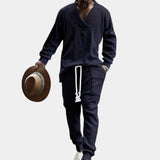 Men's blue cable-knit hoodie and pants set in size XL, featuring a cozy design perfect for winter wear, includes a hooded top with long sleeves and matching knit trousers.