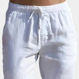 Men's white linen pants with an elastic waist, lightweight and breathable fabric, displayed against a light background.