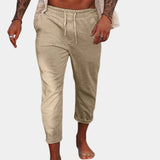 Men's khaki linen pants in size 3XL, featuring an elastic waist and lightweight, breathable fabric.