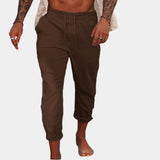 Men's brown linen pants in size 3XL, designed with an elastic waist for comfort and featuring a lightweight, breathable fabric.