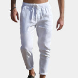 Men's white linen pants in 3XL size with an elastic waist, designed to be lightweight and breathable, displayed flat on a surface.