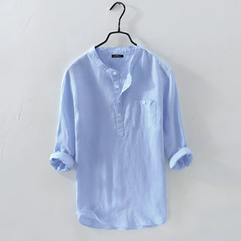 Men's blue 4XL linen shirt on a clothes hanger, featuring a collar and sleeves, displayed on a light background.