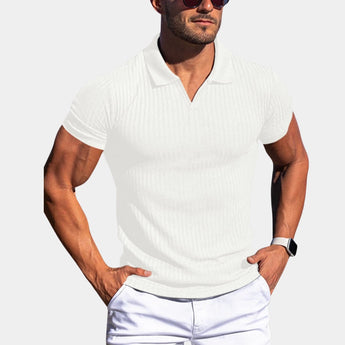 Men's white slim fit stretch cotton polo shirt worn by a person with athletic build, sunglasses, and a watch, showcasing a breathable and stylish design.