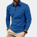 Men's long sleeve white zipper polo shirt paired with blue jeans, featuring a casual and lightweight design suitable for everyday wear. The model is wearing an accessory watch on the arm, showcasing the versatility of the top.