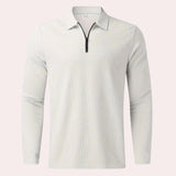 Men's white long sleeve polo shirt with a zipper collar, lightweight material suitable for casual wear.