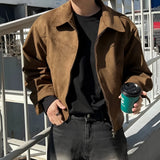 Mens black suede bomber jacket with a lightweight design, featuring a classic collar, long sleeves, and stylish urban fashion elements for fall.