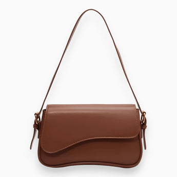 Metallic silver vegan leather crossbody bag with an adjustable strap, featuring a sleek rectangular design ideal for versatile fashion use.