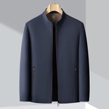 Minimalist dark blue men's bomber jacket with a sleek design, featuring a collar and buttoned front, suitable for lightweight urban fashion.
