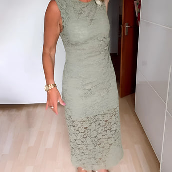 Mint green floral lace sheath dress with elegant design, featuring a fitted waist, short sleeves, and knee-length hem, ideal for a sophisticated wedding guest look.