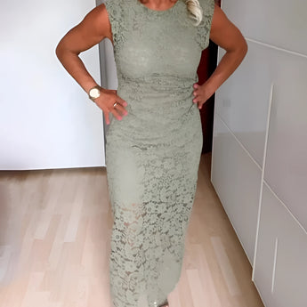 Elegant mint green floral lace sheath dress designed as a sophisticated wedding guest attire, featuring a flattering waistline and fitted silhouette, available in size 3XL, highlighting the intricate lace pattern and stylish sleeves.
