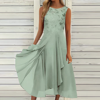 Mint green sleeveless chiffon high-low cocktail dress with a lace bodice, designed for a plus size, shown in size 4XL.