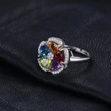 Sterling silver floral ring adorned with multi-color gemstones from JewelryPalace.
