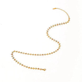 Multicolor gemstone necklace featuring 18K gold plating, luxury jewelry by YA-CHAN, with a gold-tone design and vibrant circular gemstones.