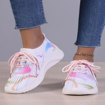 A pair of multicolor women's breathable lightweight athletic sneakers with a stylish design featuring shades of blue, purple, and pink.