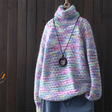 Multicolor wool turtleneck sweater in a Viola color, featuring a cozy autumn fashion pullover design with tartan pattern and shades of purple, grey, and pink.