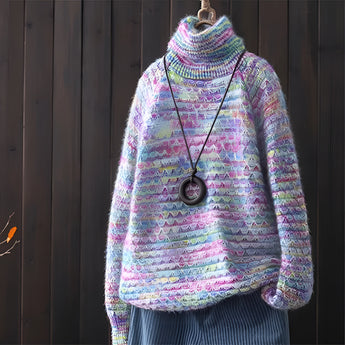 Multicolor wool turtleneck sweater in a Viola color, featuring a cozy autumn fashion pullover design with tartan pattern and shades of purple, grey, and pink.