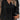 
A black long sleeve blouse for women in size 4XL, featuring lace detailing and ruffled accents along the neckline and shoulders, emphasizing a fashionable and elegant design.