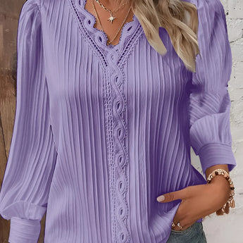 Women's mustard yellow blouse with lace detailing and ruffled accents, featuring long sleeves and a round neckline.