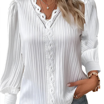 White women's long sleeve blouse featuring lace detail and ruffled accents, shown in a 4XL size.