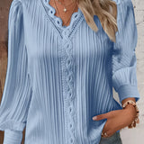 
A mustard-colored women's blouse featuring lace detailing and ruffled accents. The long sleeve top is styled with a round neckline and is designed for a plus-size fit, specifically in size 4XL. The blouse combines elements of elegance and casual wear, suitable for various occasions.