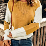 Mustard yellow chevron knit pullover sweater with long sleeves, styled casually with jeans, showcasing a chic autumn look.
