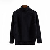 A mustard yellow pleated turtleneck sweater designed for cozy winter wear, featuring long sleeves and a textured knit pattern.