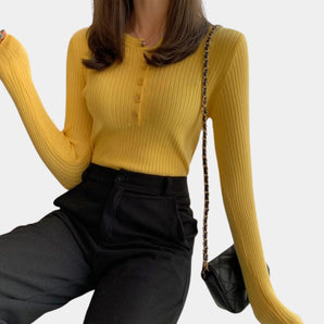 Mustard yellow ribbed button-up sweater in size XL, featuring a collar and long sleeves, styled on a person to showcase trendy fall fashion.