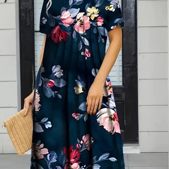 Navy knee-length A-line floral dress with short sleeves and pockets, featuring a white and blue print perfect for casual daywear.