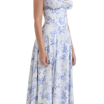 Navy blue floral A-line midi cocktail dress with spaghetti straps, showcasing a fitted waist and flowing skirt.