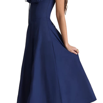Navy blue floral A-line midi cocktail dress with spaghetti straps, featuring a fitted bodice and flowing skirt.