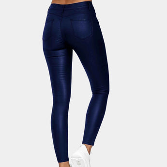 Navy blue high waist stretch jeggings for women, featuring a skinny denim style, designed with a focus on fashion and comfort.